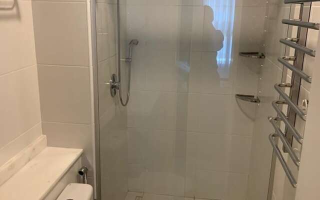 Quarto e Sala Particular em Aparthotel