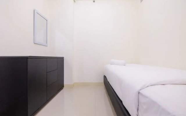 2 Bedrooms at Green Pramuka City Apartment By Travelio