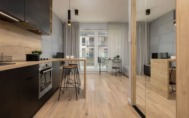 Studio Near Manufaktura Łódź by Renters