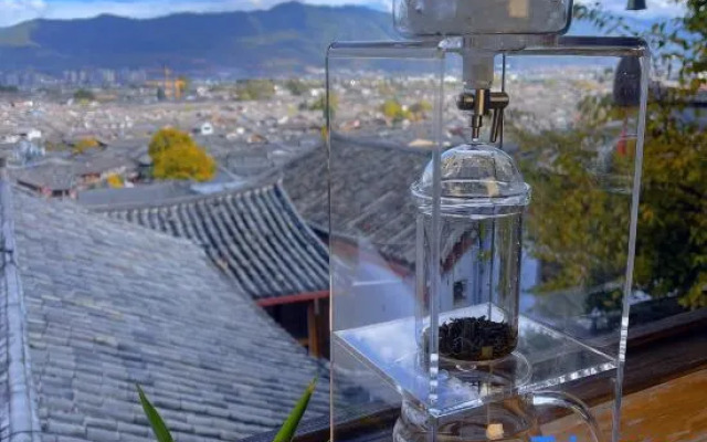 Lijiang Zhenmei Shishan Scenic Inn (Sifang Street Big Water Wheel Store)