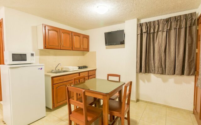 Suites Poliforum Inn