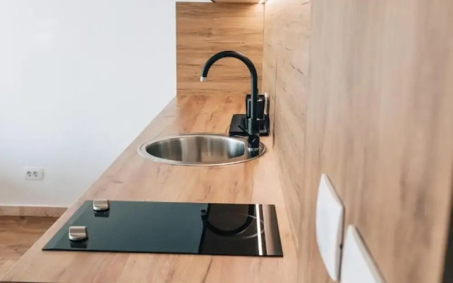 Saxofonia Apt. Lux