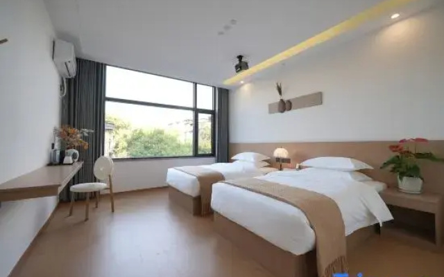 Xishang Mantingju Hotel (Jingdezhen People Square Tao Yang Alley)
