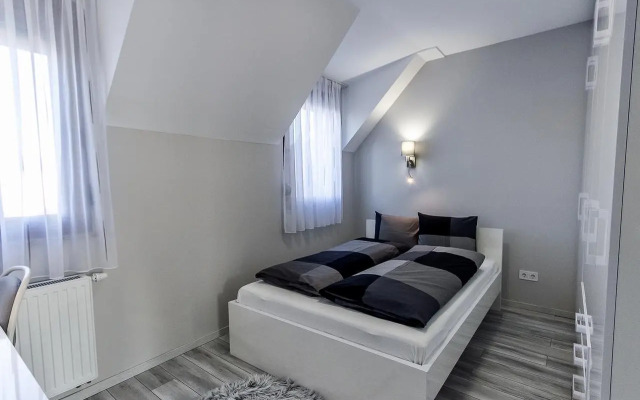 Grey Suites Pecs