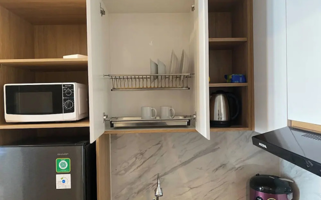 Spacious and Restful 1BR at Vasanta Innopark Apartment