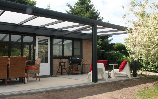 Bright Holiday Home in Lanaken near Lake with Garden