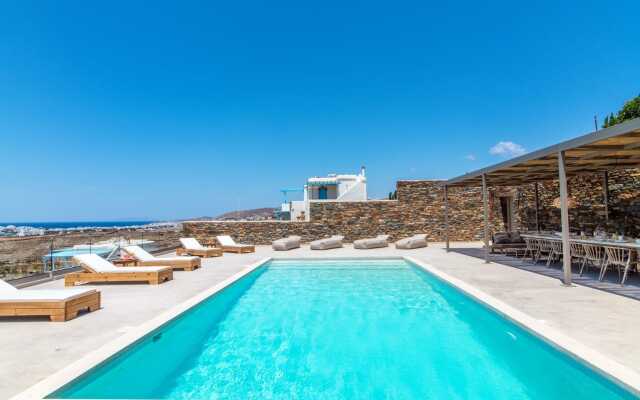 Monogram Travel Tinos