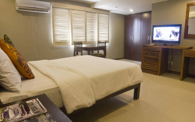 OYO 103 Artina Suites Hotel