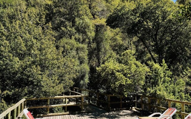 Cabañas entre montañas con tinajas calientes