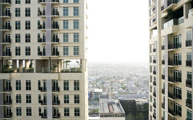 Comfy 2BR Puri Orchard Apartment