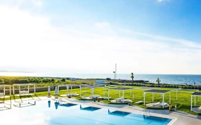 Aphroditebeachfrontresort Unique gem Direct by sea