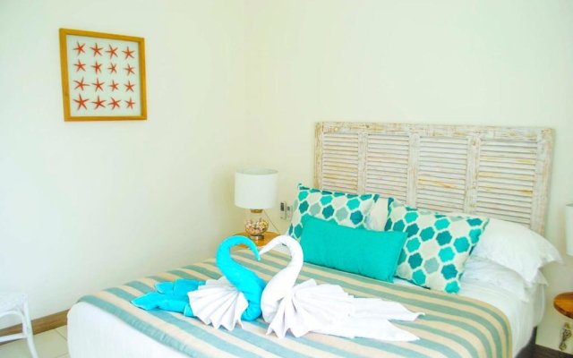 L'Escale 3 bedrooms Sea View and Beachfront Suite by Dream Escapes