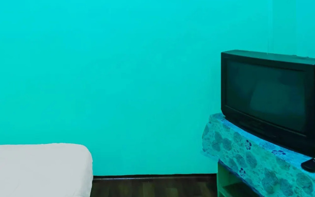 SPOT ON 92186 Penginapan LorraNearPasar Oleh Oleh