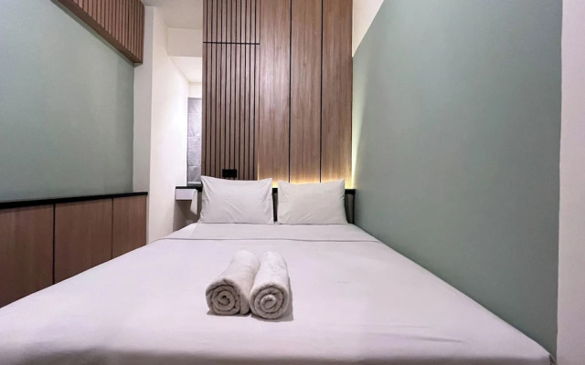 Warm And Homey 2Br At Vida View Makassar Apartment