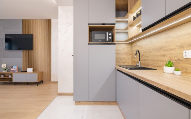 Dark Blue Apartment in Kraków by Renters