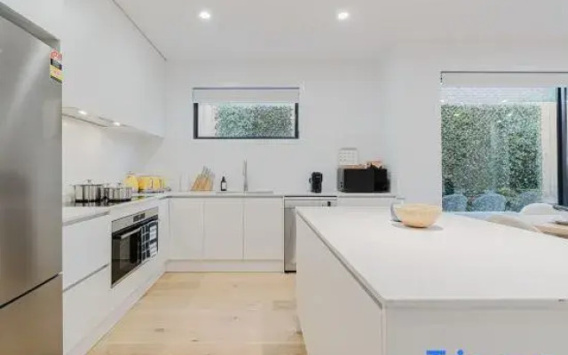 Stylish 4BR Townhouse with Private Courtyard
