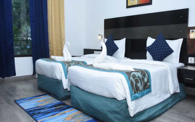 Capital O 605 Hotel Camria