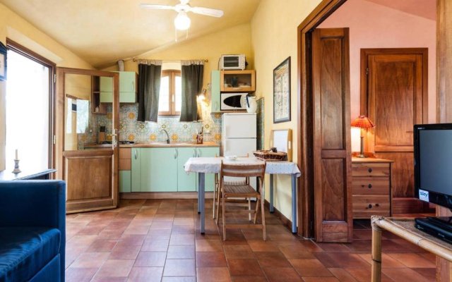 One bedroom villa with shared pool enclosed garden and wifi at Pisa