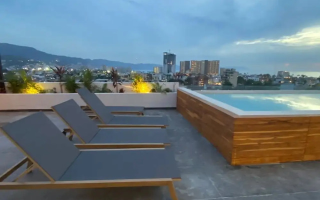 Serene Stylish Stay Roof Pool and Lounge