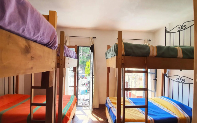 Capital O Hotel Al Son de los Santos - Hostel
