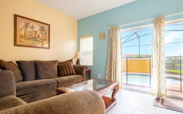 Private Screened Splash Pool Overlooking Tranquil Lake Right Beside Disney World by Florida Dream Homes