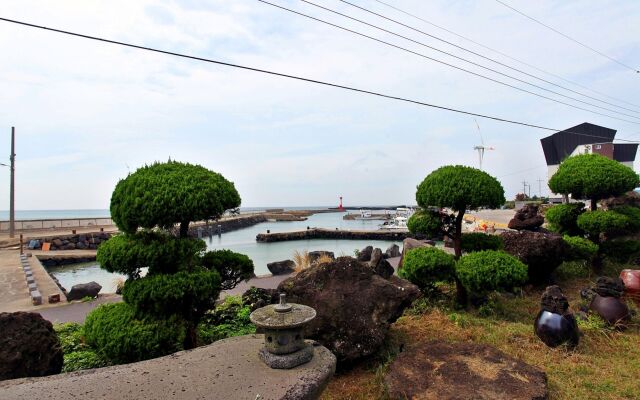 Windmill and Sea Pension