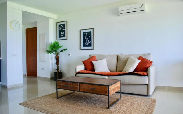 Le Baileys - Spacieux appartement en rez-de-jardin vue lagon