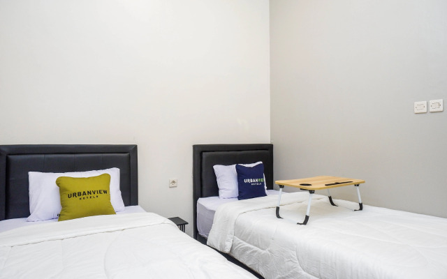 Urbanview Hotel John Sweet Home
