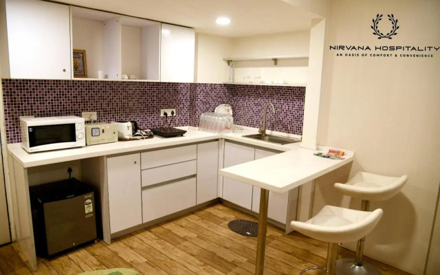 Luxurious Studio Homes Nr Surat Airport by Nirvana Hospitality