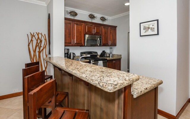 Elegant Oceanview Condo with Spacious Open-Concept Floor Plan and Inviting Beach Design