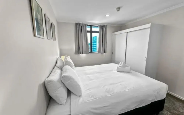 Cozy 2-Bedroom Retreat Steps From Sky Tower