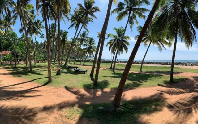 Maadathil Cottages