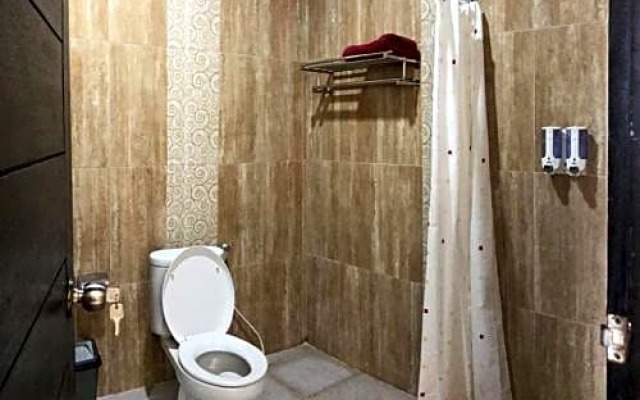 RedDoorz Plus near Dreamland Beach