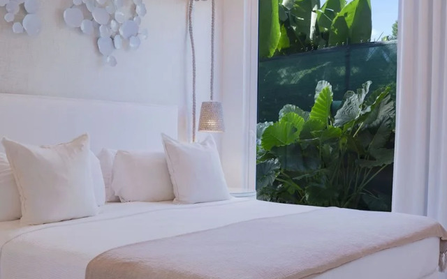 Palm Grove Villas & Hotel