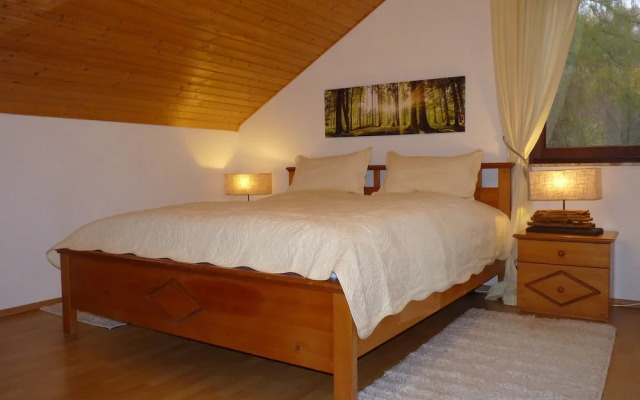 Ferienwohnung im Wald mit Kamin