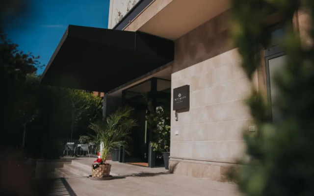 Infinity Hotel & More
