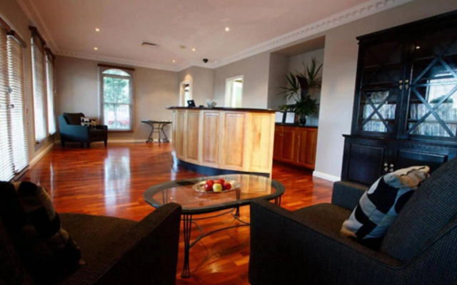 Carlyle Suites & Apartments