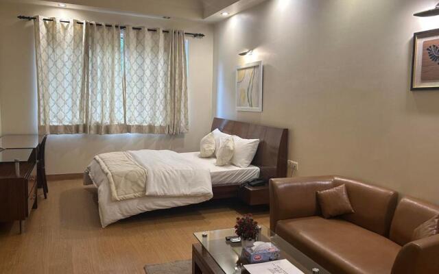 Enkay Suites - DLF CyberCity