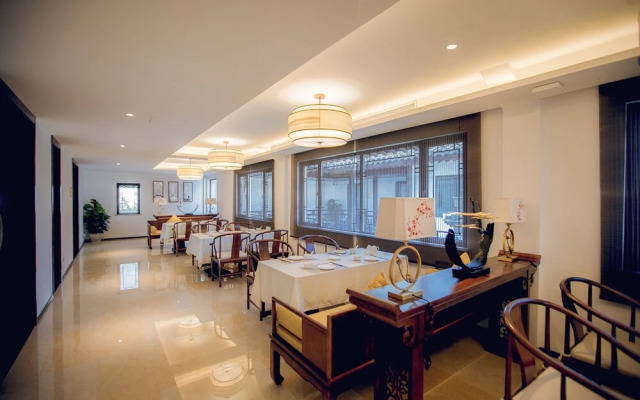 Xinhualian Lv Xin Gu Hotel