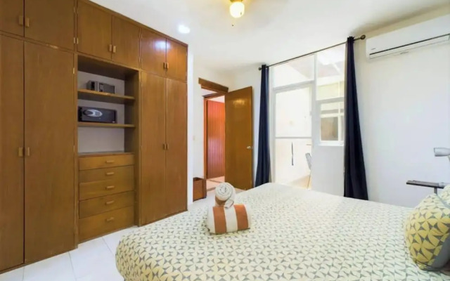 Stylish 2BR Retreat With Private Patio