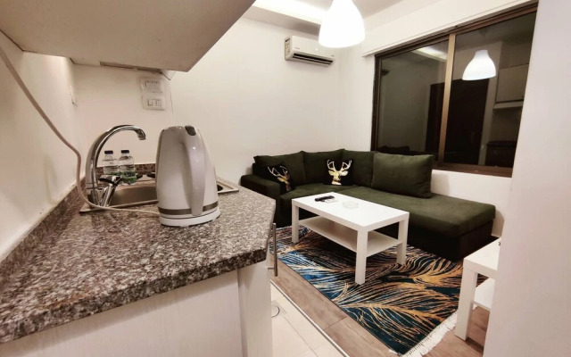 "28 1- Lovely Apartment Close to all Services"