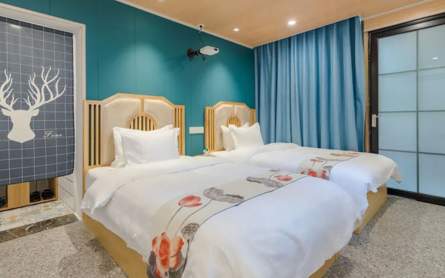 Floral Hotel Yi Shu Yu She Zhouzhuang