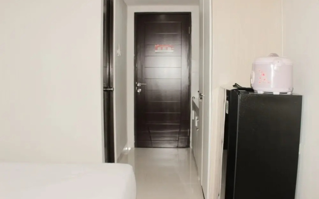 Homey And Cozy Studio Apartment At Elvis Tower
