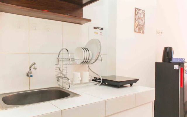 Chic and Cozy Studio at Riverview Jababeka Apartment