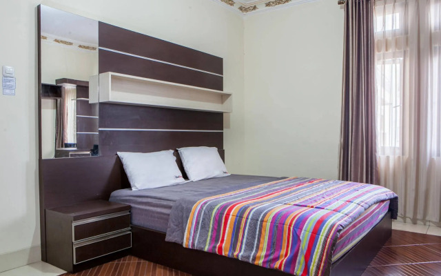 RedDoorz Plus near Isola UPI
