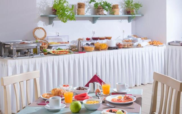 Astra Village Apartments & Suites