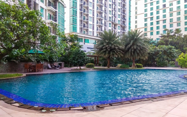 2BR Apartment with Sofa Bed at Woodland Park Residence By Travelio