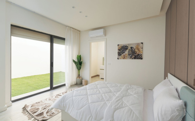 ALSAWAH 2BR Garden - Lake View Residence