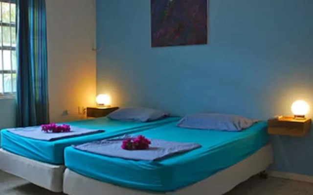 Caribbean Flower Apartments