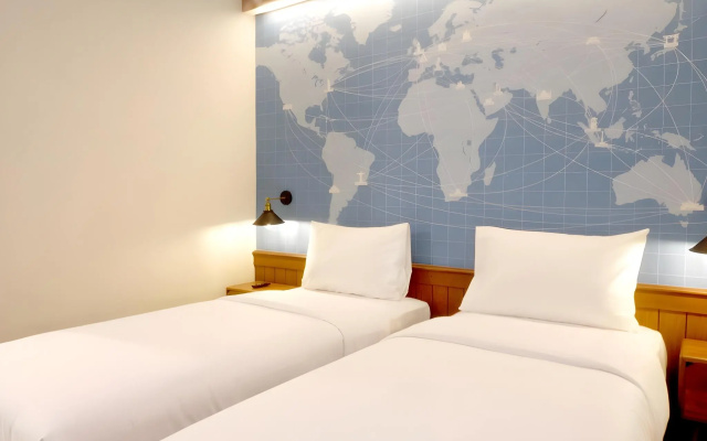 Nunia Inn Bandara – Guest Rooms – Tangerang